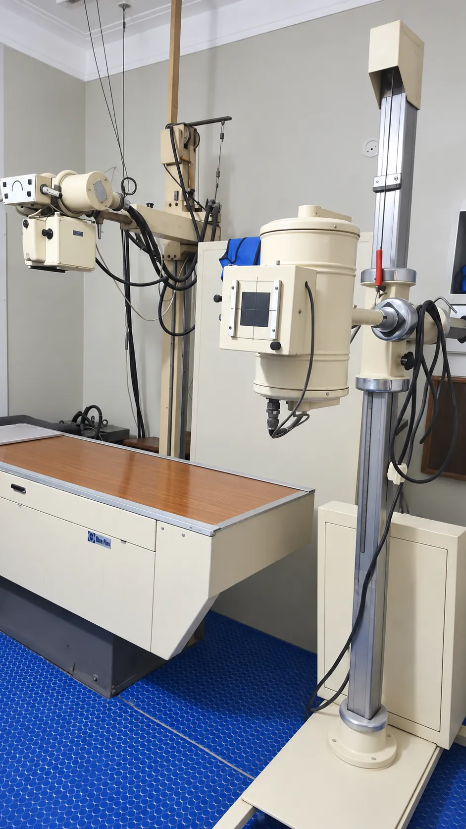 X-ray machine and examination table in the radiology room